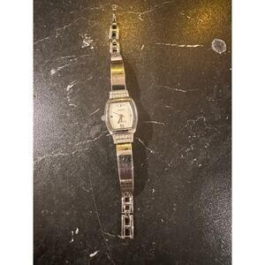 Elegant Ellen Tracy Ladies Bangle Watch Tonneau Face Crystal Bezel